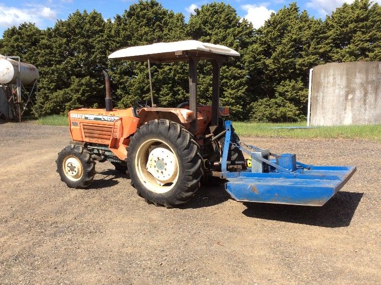 Kubota L405 Tractor, Slasher, Offset Discs Plough Machinery for sale NSW